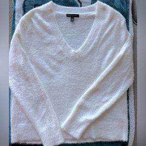 Banana Republic white fluffy sweater in size medium. Never worn no tags.